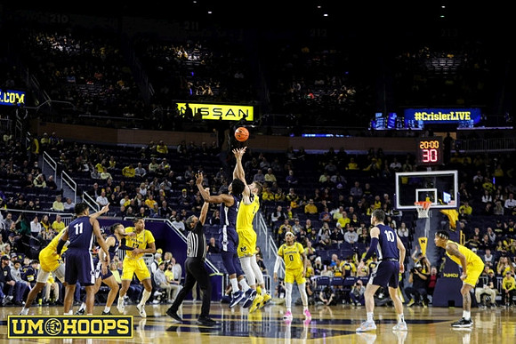Jett Howard (13), Kobe Bufkin (2), Hunter Dickinson (1), Dug McDaniel (0), and Terrance Williams II (5)
