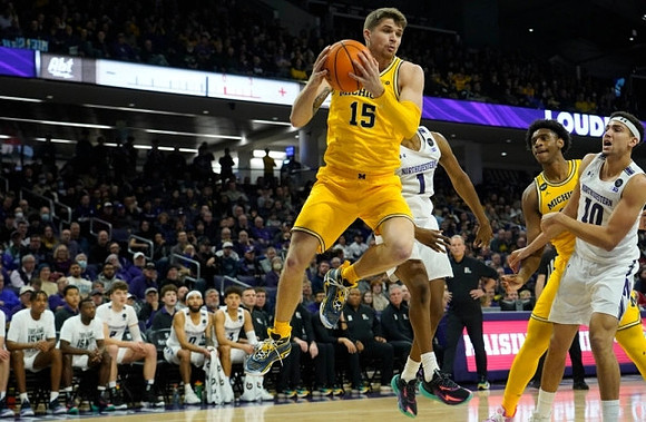 Joey Baker (15) and Tarris Reed Jr. (32)