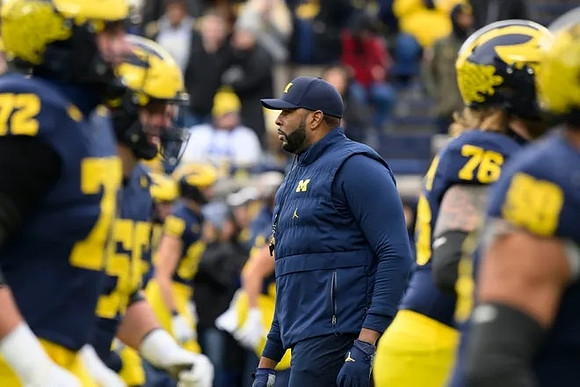 Sherrone Moore and Michigan Team