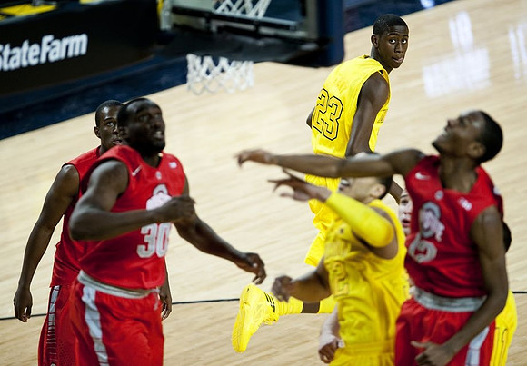 Caris LeVert (23) and Jordan Morgan (52)