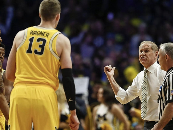Moritz Wagner (13) and John Beilein