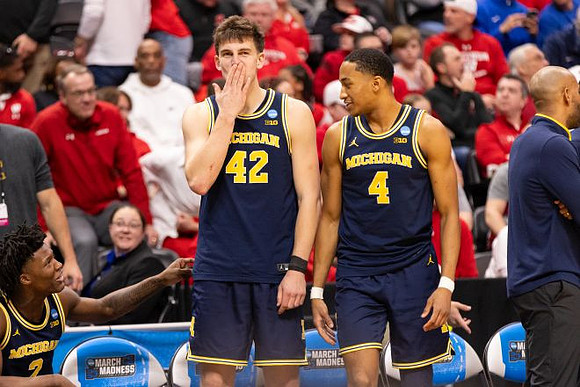 L.J. Cason (2), Will Tschetter (42), and Nimari Burnett (4)