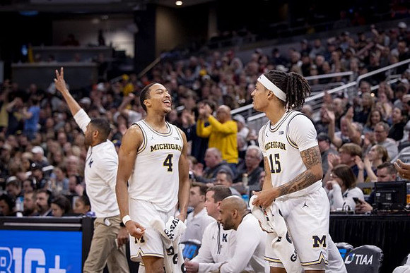 Nimari Burnett (4) and Rubin Jones (15)