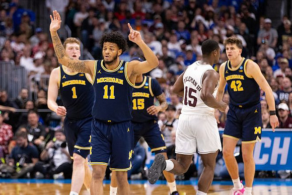 Danny Wolf (1), Roddy Gayle Jr. (11), Rubin Jones (15), and Will Tschetter (42)