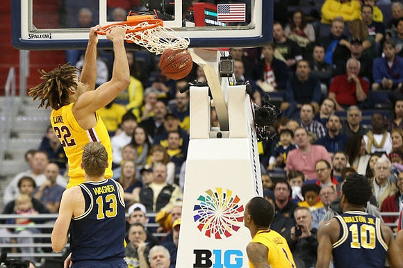 Moritz Wagner (13) and Derrick Walton Jr. (10)