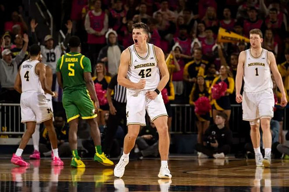 Nimari Burnett (4), Will Tschetter (42), and Danny Wolf (1)