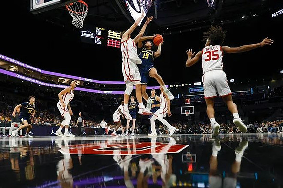 Justin Pippen (10), Sam Walters (24), Vladislav Goldin (50), and Rubin Jones (15)
