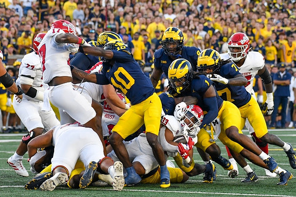 Zeke Berry (10), Jaishawn Barham (1), and Makari Paige (7)