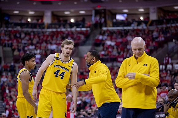 Eli Brooks (55), Jaron Faulds (44), Howard Eisley, and Phil Martelli