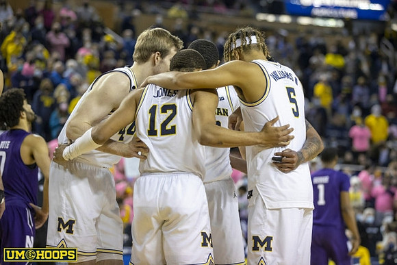 Jaron Faulds (44), DeVante' Jones (12), Caleb Houstan (22), and Terrance Williams II (5)