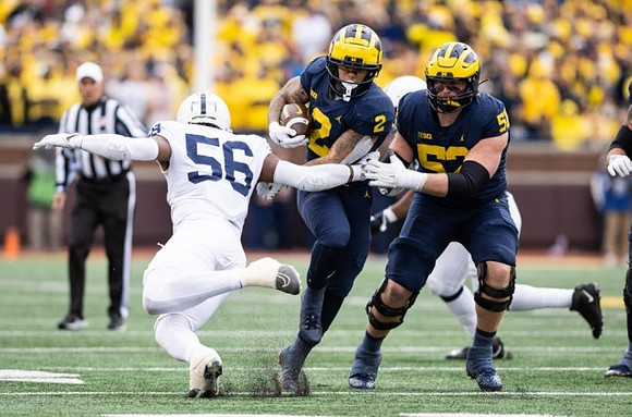 Blake Corum (2) and Karsen Barnhart (52)