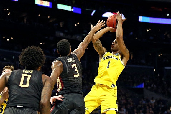 Charles Matthews (1) and Jon Teske (15)