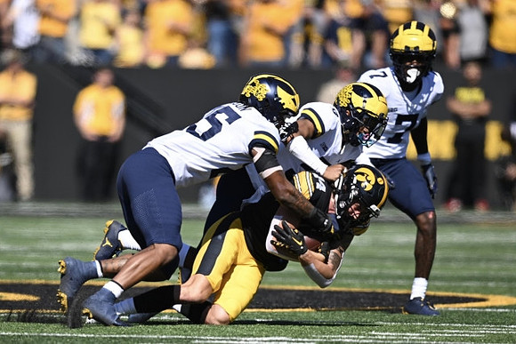 Junior Colson (25) and Makari Paige (7)