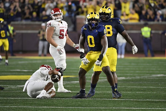 Josaiah Stewart (0) and Kenneth Grant (78)