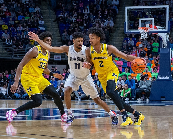 Tarris Reed Jr. (32) and Kobe Bufkin (2)