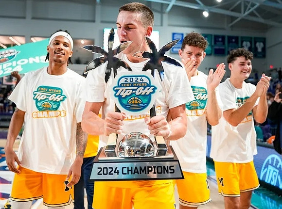 Michigan Team and Fort Myers Tip-Off Championship Trophy