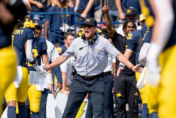 Jim Harbaugh and Michigan Team