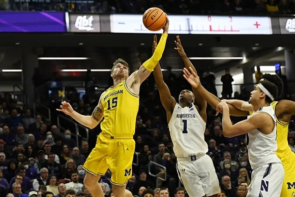 Joey Baker (15) and Tarris Reed Jr. (32)