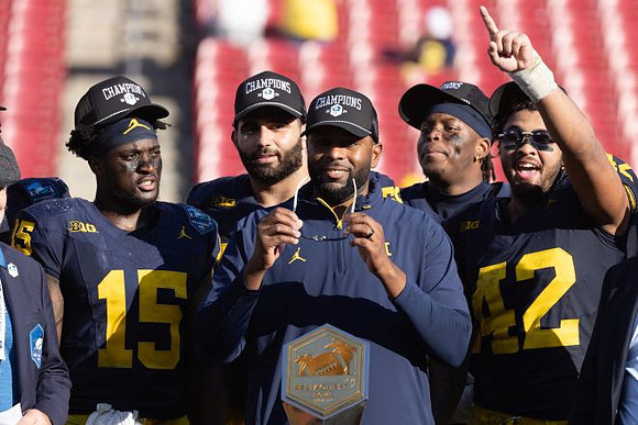 Sherrone Moore and Michigan Team