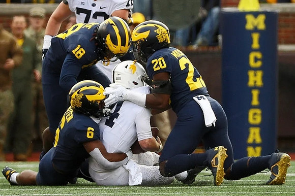 Eyabi Anoma Okie (18), R.J. Moten (6), and Kalel Mullings (20)