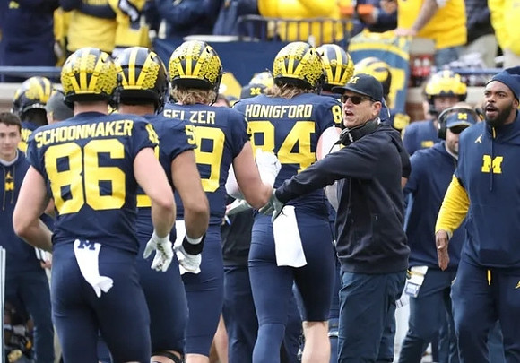 Luke Schoonmaker (86), Carter Selzer (89), Joel Honigford (84), and Jim Harbaugh