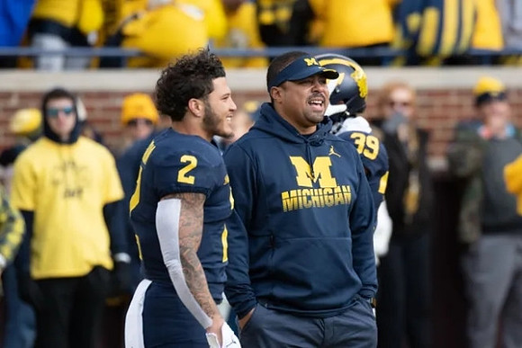 Blake Corum (2) and Mike Hart