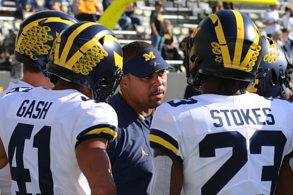 Isaiah Gash (41), Mike Hart, and CJ Stokes (23)