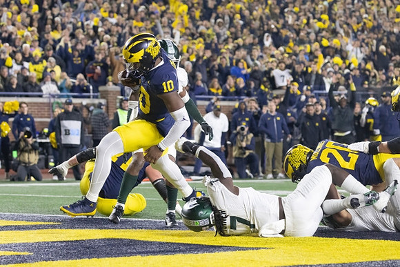 Evan Link (71), Alex Orji (10), and Kalel Mullings (20)