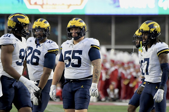 Cameron Brandt (91), Rayshaun Benny (26), Mason Graham (55), and Makari Paige (7)