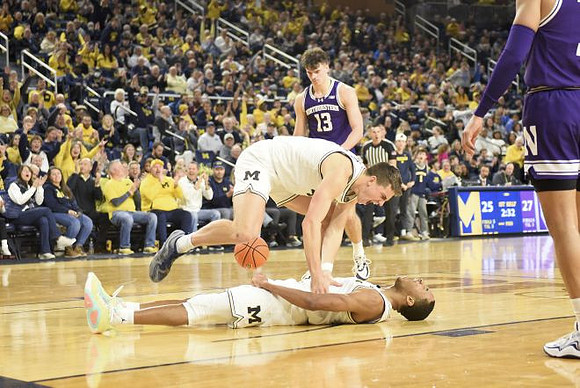 Will Tschetter (42) and Nimari Burnett (4)