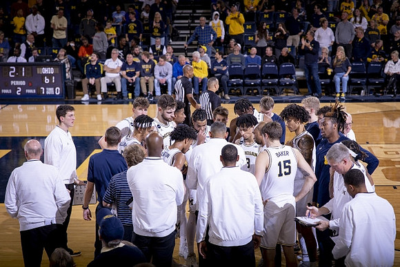 Juwan Howard and Michigan Team