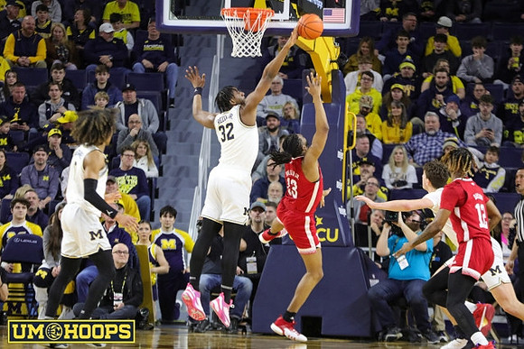 Dug McDaniel (0), Tarris Reed Jr. (32), and Will Tschetter (42)