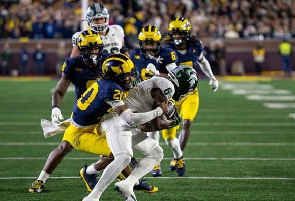 Derrick Moore (8), Josaiah Stewart (0), and Brandyn Hillman (6)