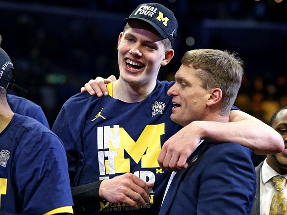 Moritz Wagner (13) and Luke Yaklich