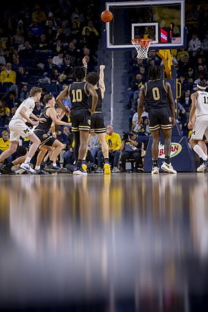 Sam Walters (24) and Roddy Gayle Jr. (11)