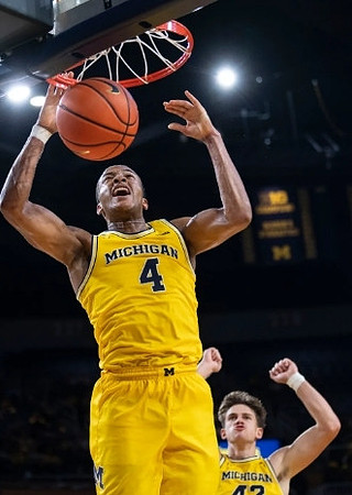 Nimari Burnett (4) and Will Tschetter (42)