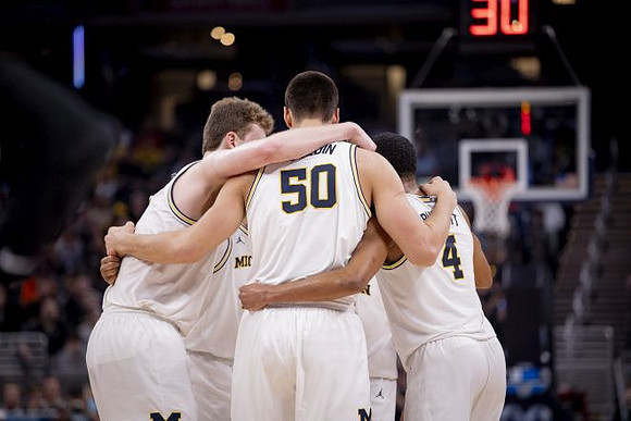 Danny Wolf (1), Vladislav Goldin (50), and Nimari Burnett (4)