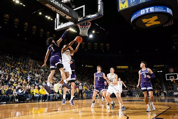 Nimari Burnett (4), Will Tschetter (42), and Danny Wolf (1)