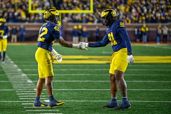 Makari Paige (7), TJ Guy (42), and Cameron Brandt (91)