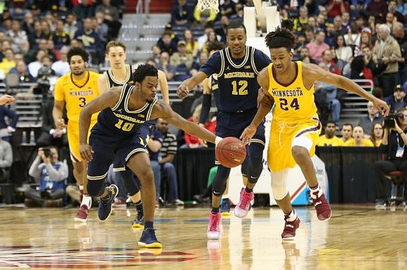 Derrick Walton Jr. (10) and Muhammad-Ali Abdur-Rahkman (12)