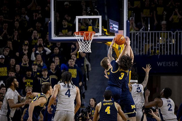 Danny Wolf (1), Tre Donaldson (3), and Nimari Burnett (4)
