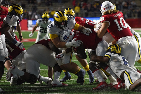 Quinten Johnson (28), Mason Graham (55), and Derrick Moore (8)