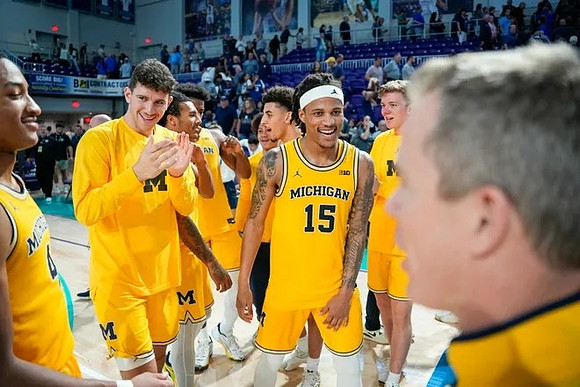 Dusty May and Michigan Team