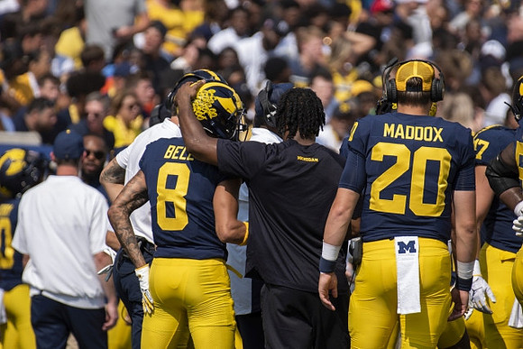 Ronnie Bell (8), Donovan Edwards (7), and Andy Maddox (20)