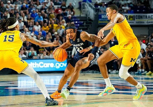 Rubin Jones (15) and Nimari Burnett (4)