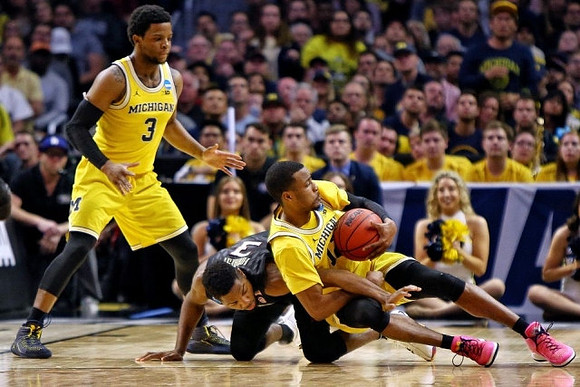 Zavier Simpson (3) and Muhammad-Ali Abdur-Rahkman (12)