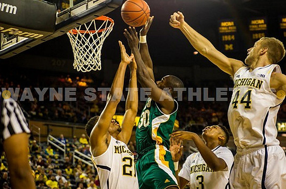 Zak Irvin (21), Kameron Chatman (3), and Max Bielfeldt (44)