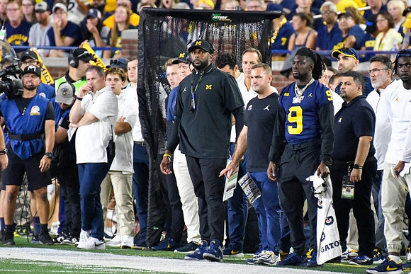 Sherrone Moore and Michigan Team