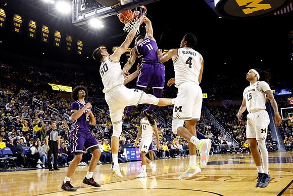 Vladislav Goldin (50), Roddy Gayle Jr. (11), Nimari Burnett (4), and Rubin Jones (15)