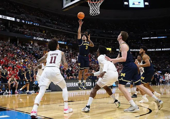 Tre Donaldson (3), Danny Wolf (1), and Roddy Gayle Jr. (11)